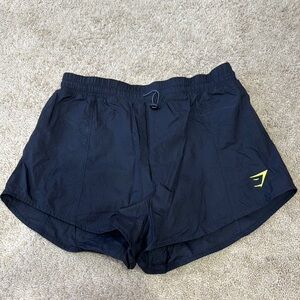 Black Athletic Shorts with Yellow Logo